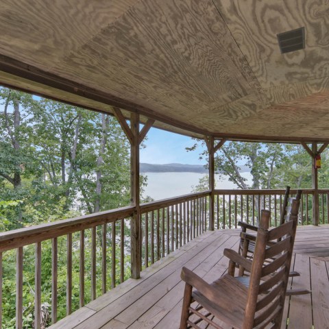 a wooden bench overlooking a body of water