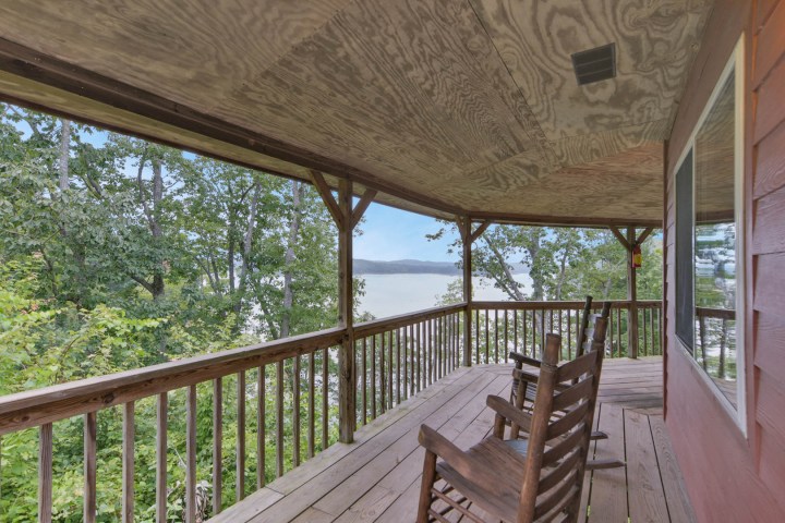 a wooden bench overlooking a body of water
