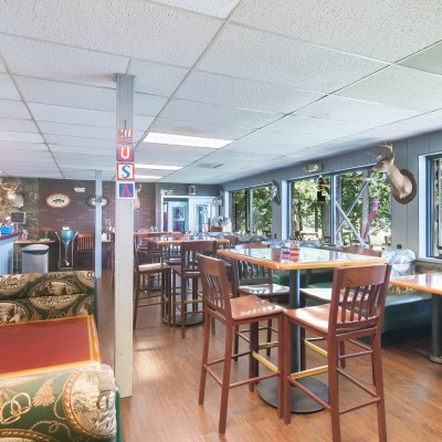 a room filled with furniture and a table