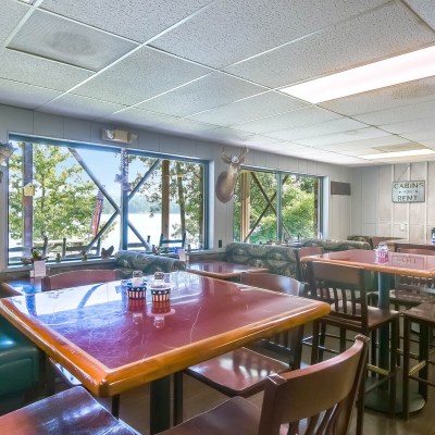 a dining room table in front of a window
