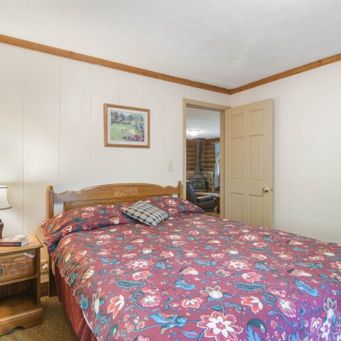 a bedroom with a bed in a hotel room