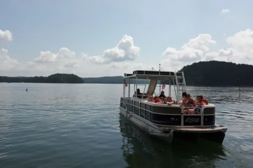 a small boat in a large body of water