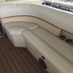 a boat sitting on top of a car