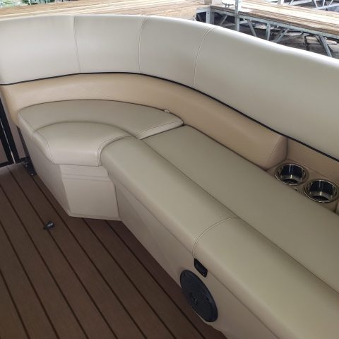 a boat sitting on top of a car