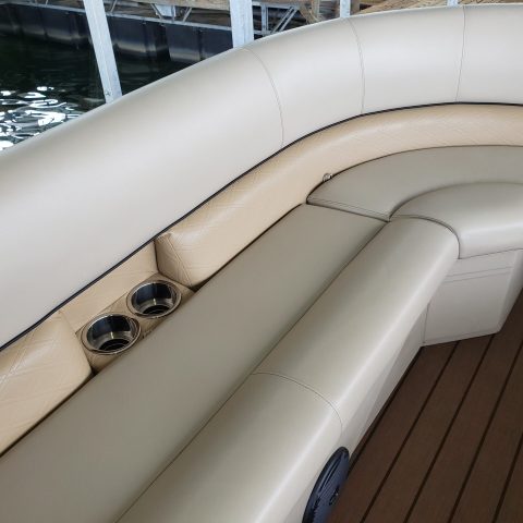 a boat sitting on top of a car