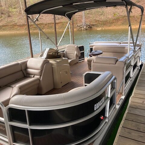 a boat sitting on top of a wooden chair