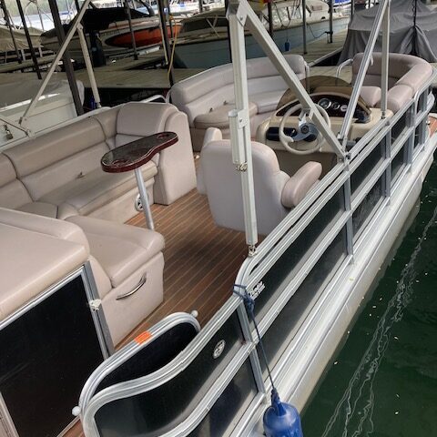 a boat sitting on top of a wooden chair
