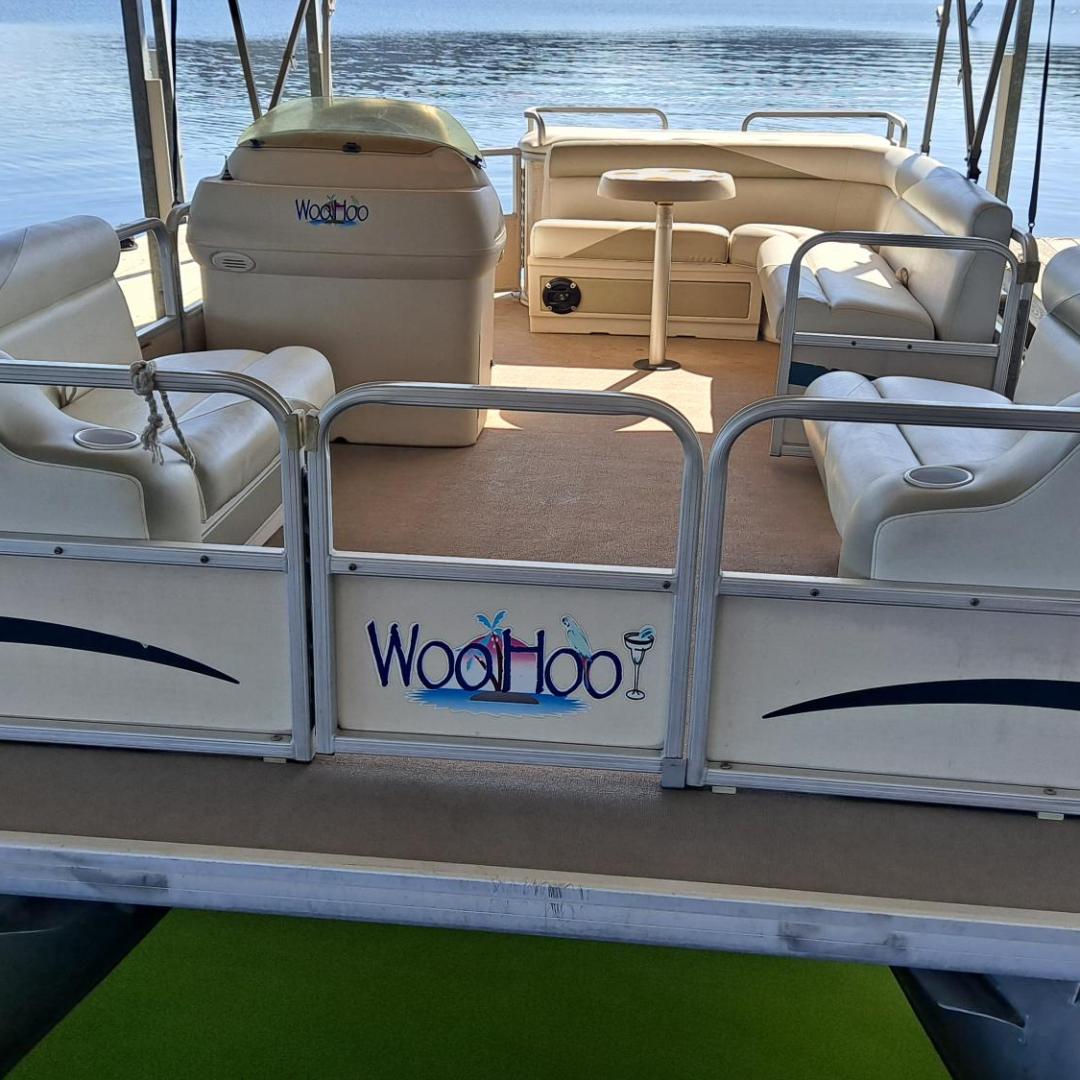 a boat sitting AT A DOCK