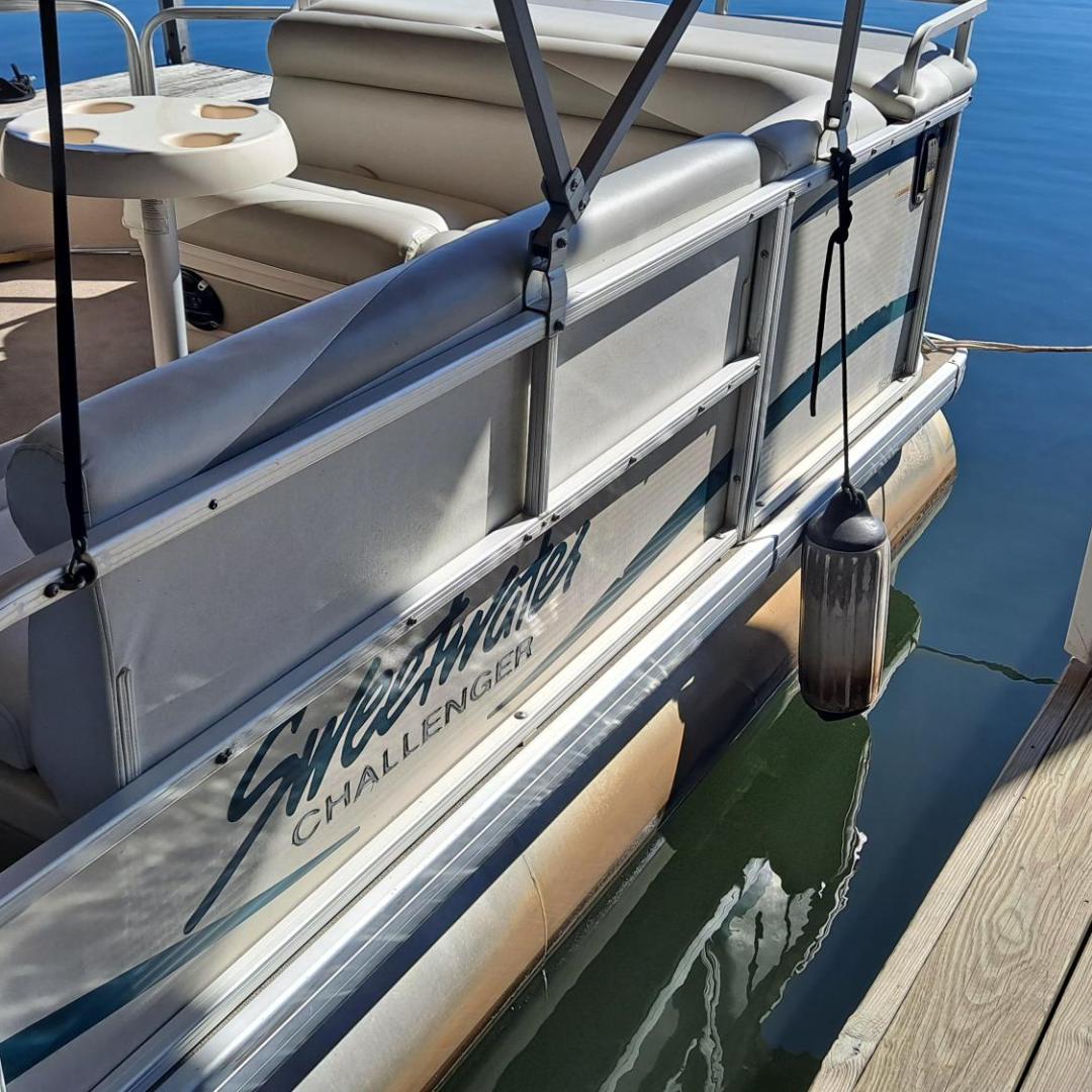 a boat that is sitting on the side of the road