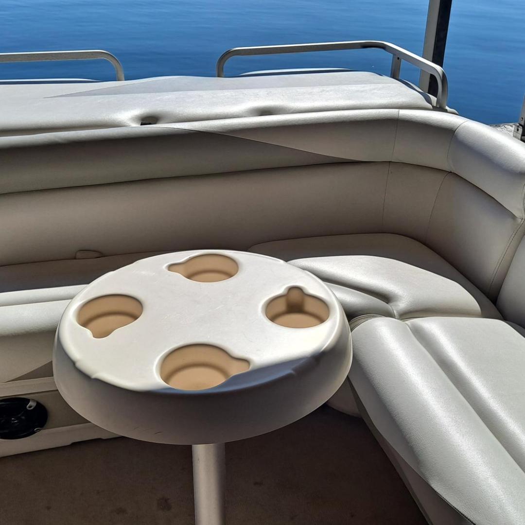 a boat sitting on top of a car