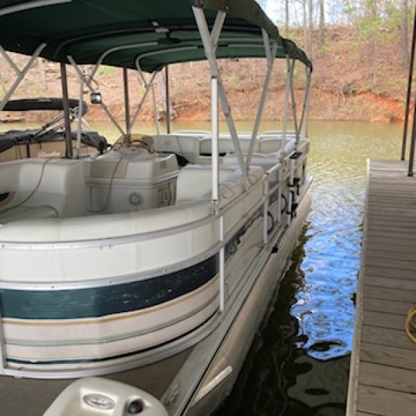 a boat that is sitting on the side of a building