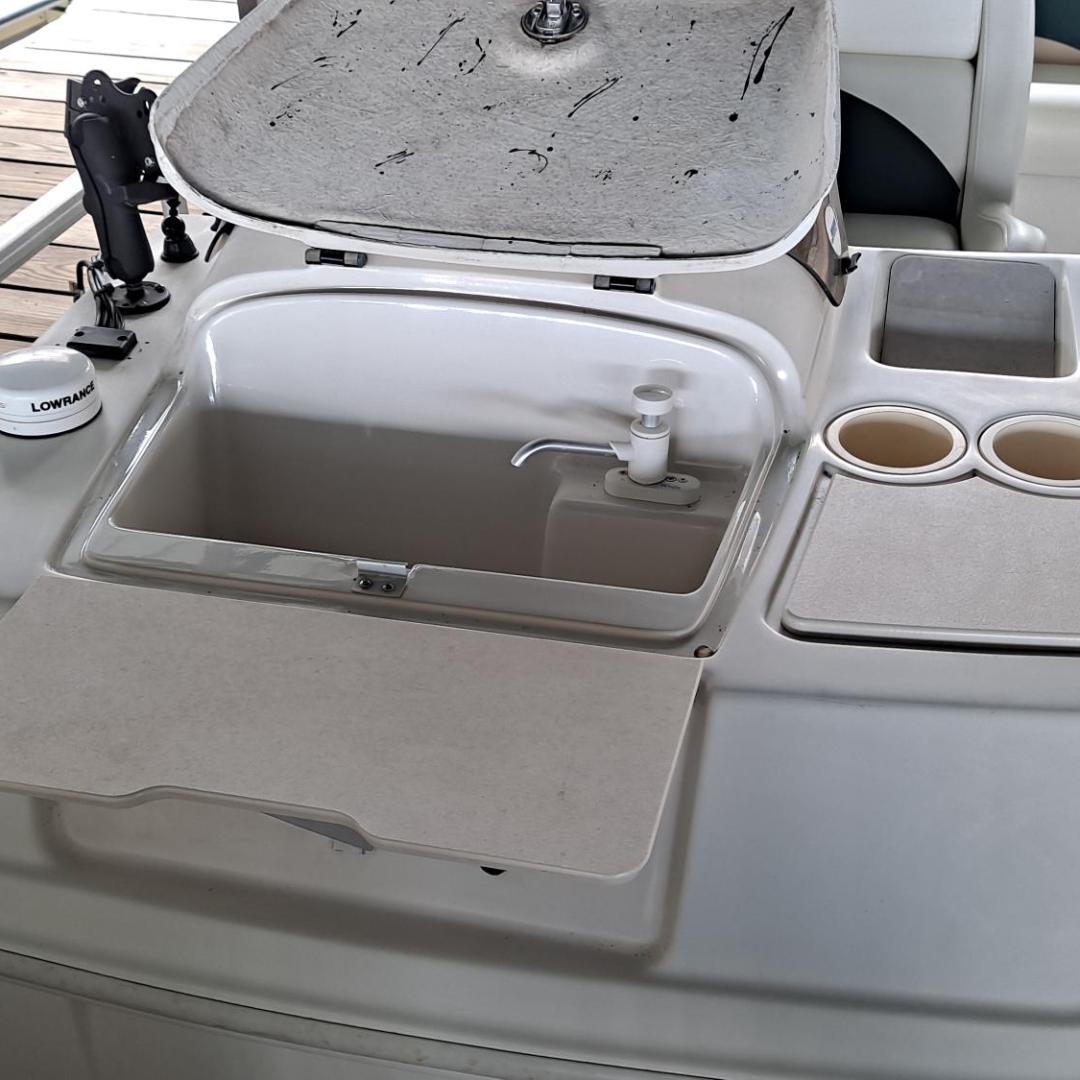 a sink sitting under a car