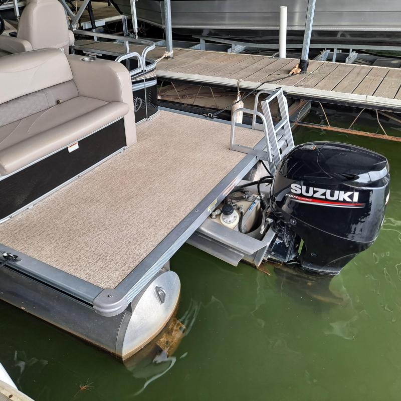 a boat sitting on top of a car