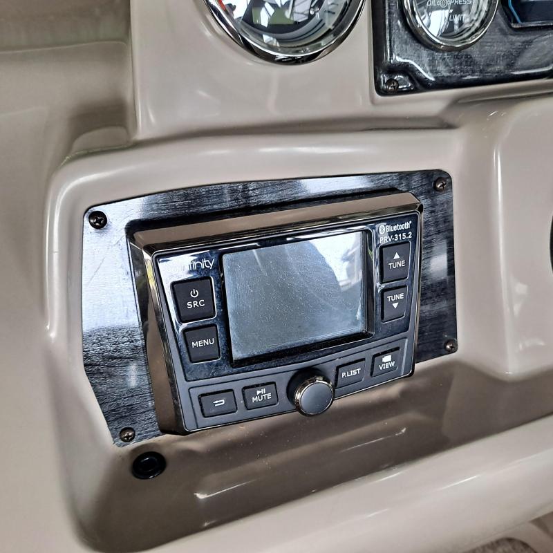 a stove top oven sitting inside of a car