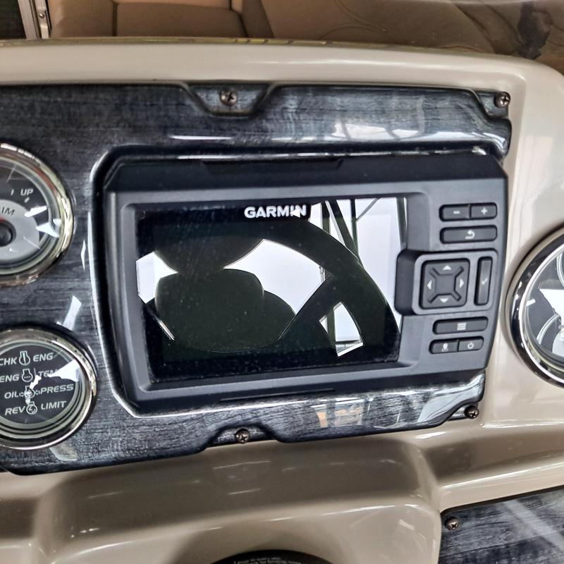 a stove top oven sitting inside of a car