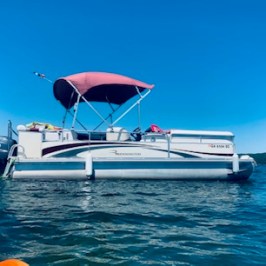 a small boat in a body of water